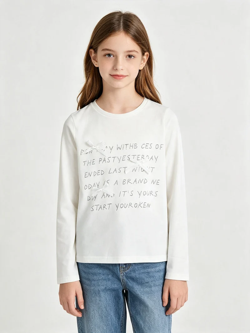 T-shirt da ragazza a maniche lunghe con scritte e fiocchetti - bianco