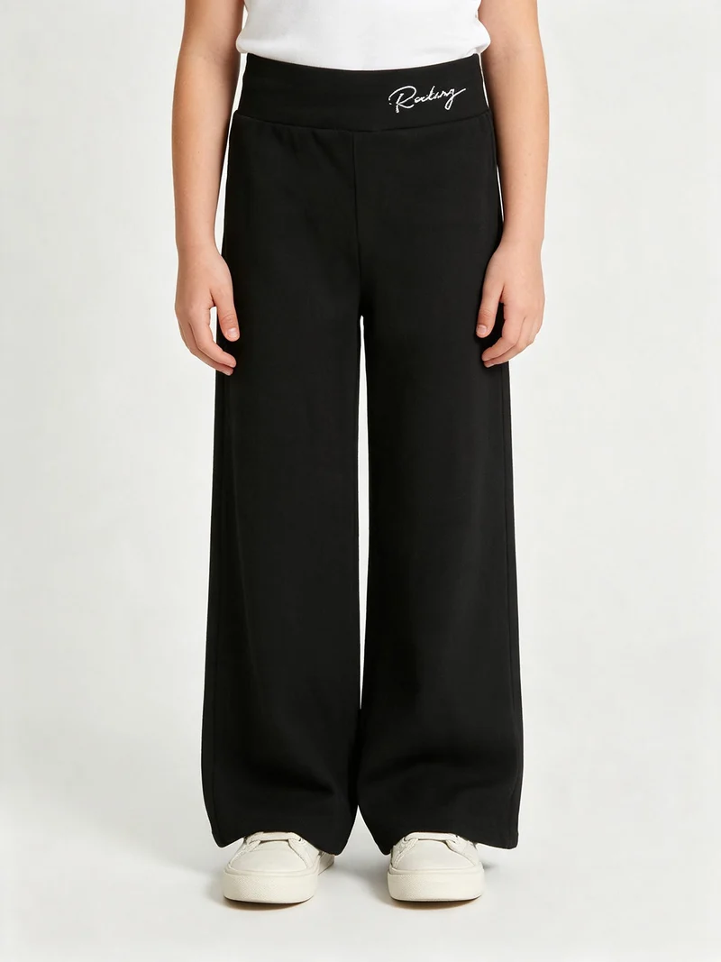 Leggings da bambina effetto ciniglia con finale a zampa - nero
