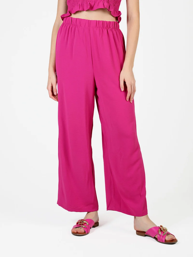 Pantaloni leggeri da donna a gamba larga - fucsia
