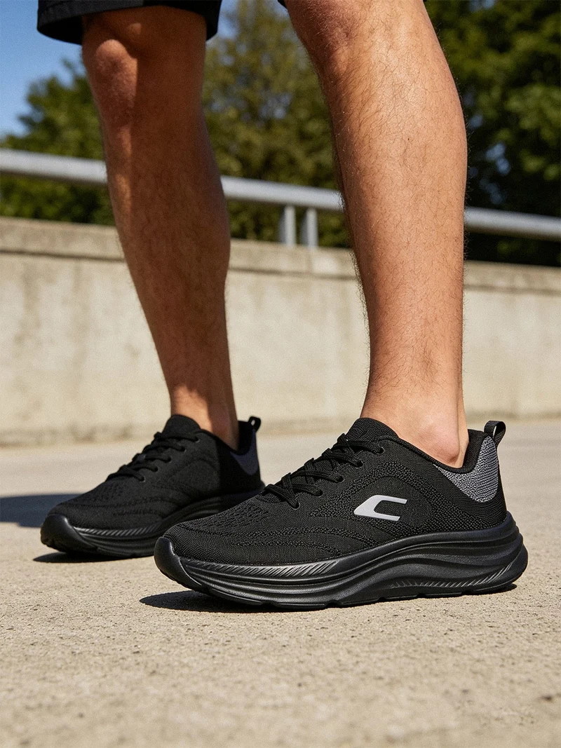 Sneakers sportive da uomo in tessuto - nero