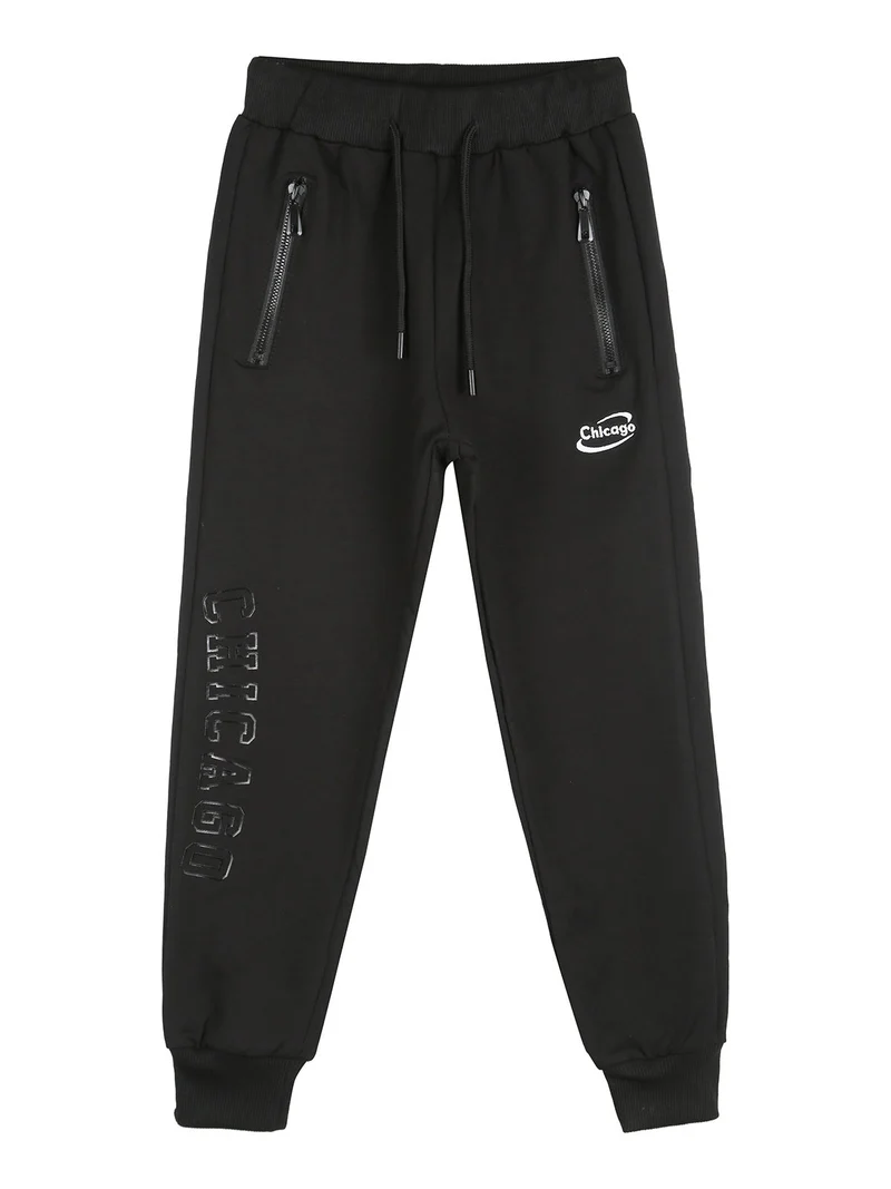 Pantaloni tuta da bambino con polsini e coulisse - nero
