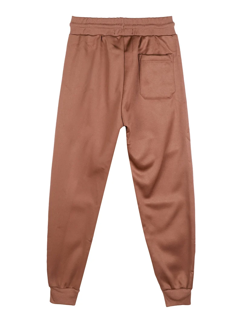 Pantaloni tuta da bambino con polsini - marrone