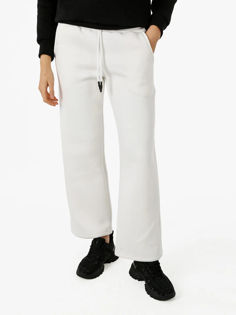 Pantaloni da donna in felpa a gamba larga con coulisse - bianco