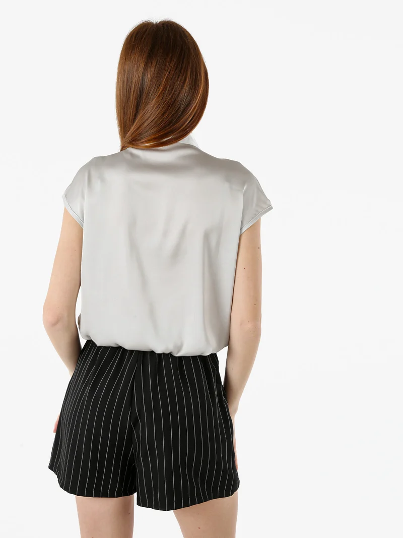 Blusa donna senza maniche con scollo a V profondo - perla