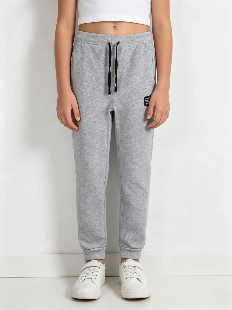 Pantaloni tuta da ragazza felpati - grigio