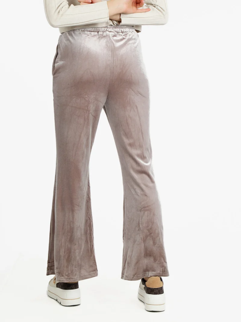 Pantaloni a zampa da donna in velluto - taupe