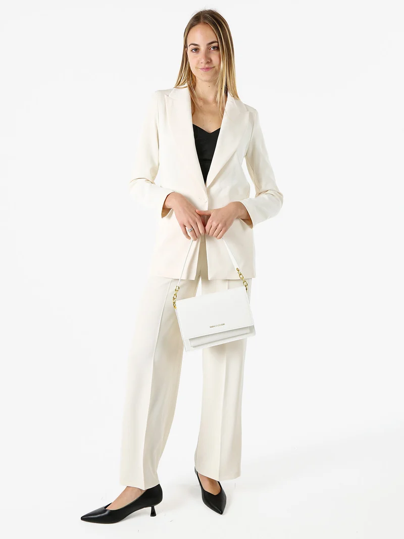 Completo elegante da donna con giacca e pantaloni - panna