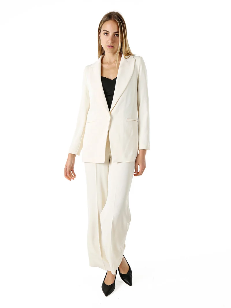 Completo elegante da donna con giacca e pantaloni - panna