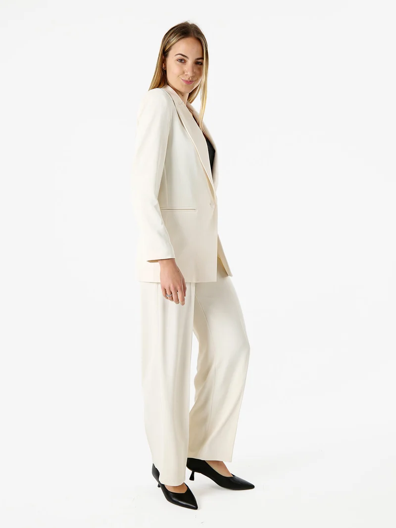 Completo elegante da donna con giacca e pantaloni - panna