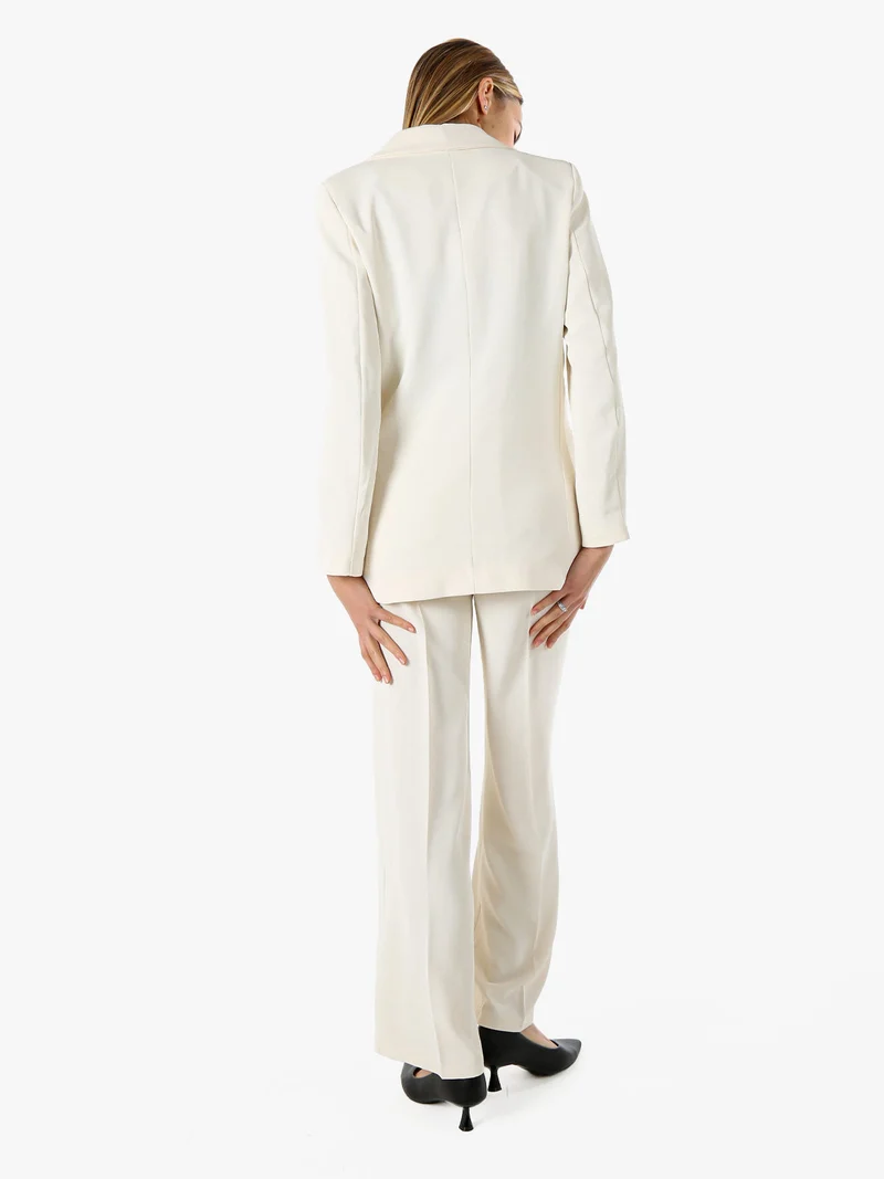 Completo elegante da donna con giacca e pantaloni - panna