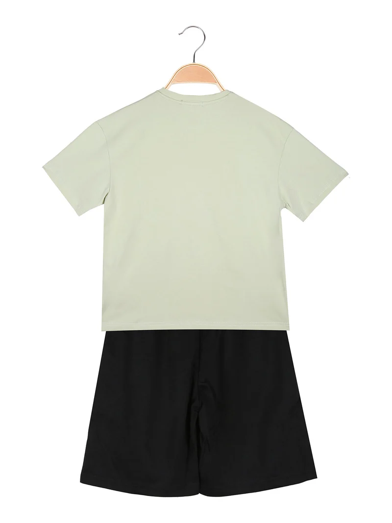 Completo corto da bambino in cotone con t-shirt e bermuda - pistacchio