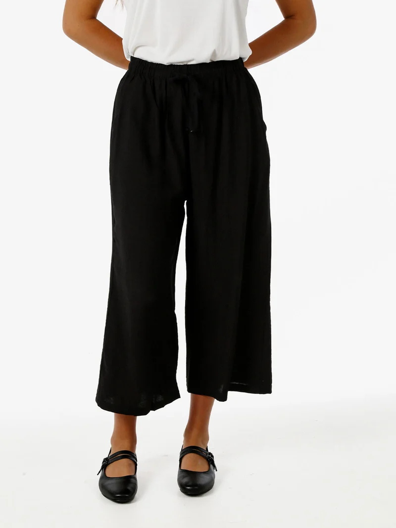 Pantaloni donna cropped a gamba larga con coulisse - nero
