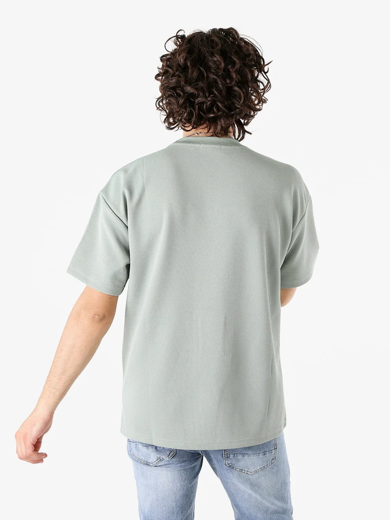 T-shirt girocollo da uomo a nido d'ape - acqua marina