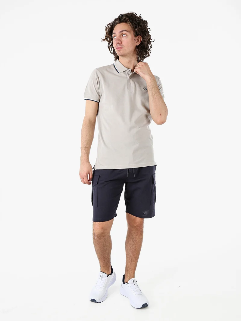 Bermuda da uomo in felpa con tasconi laterali - blu scuro