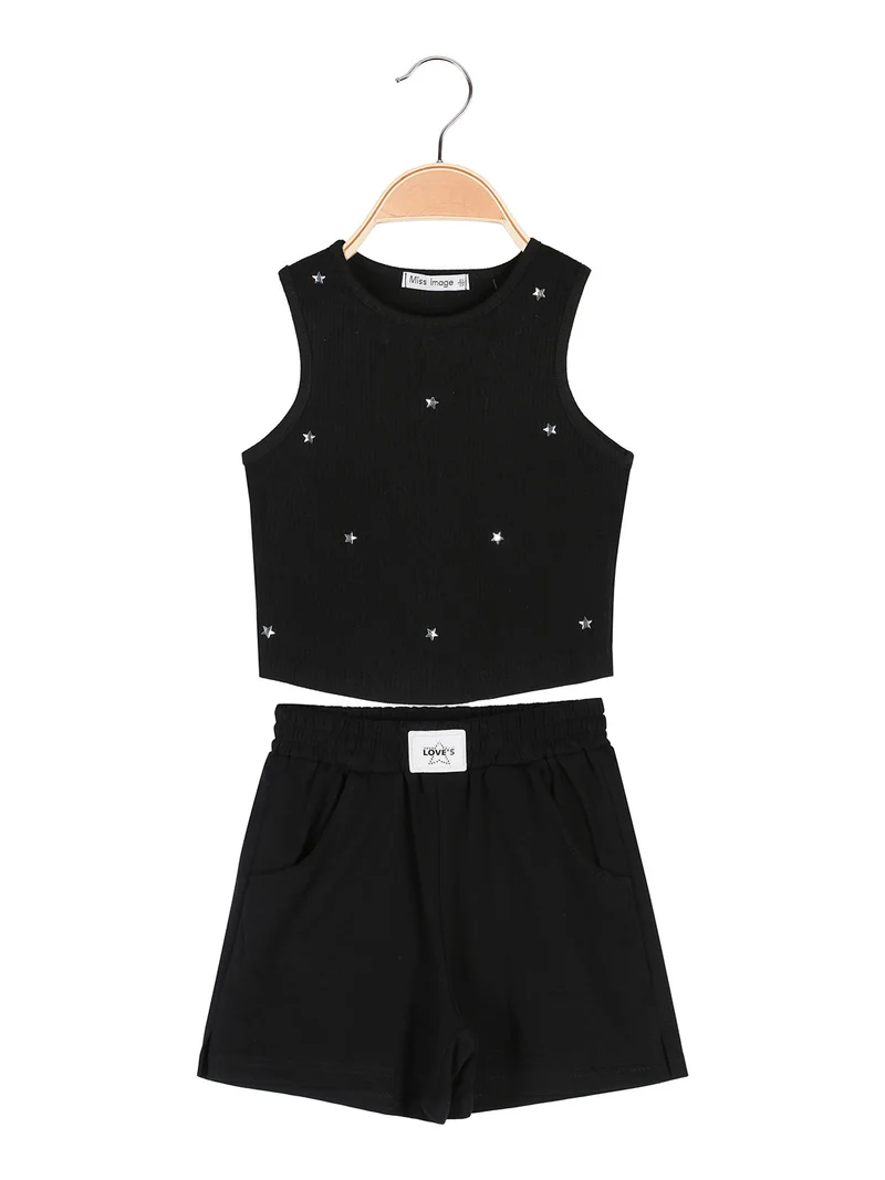 Completo corto da ragazza con top a costine e shorts - nero