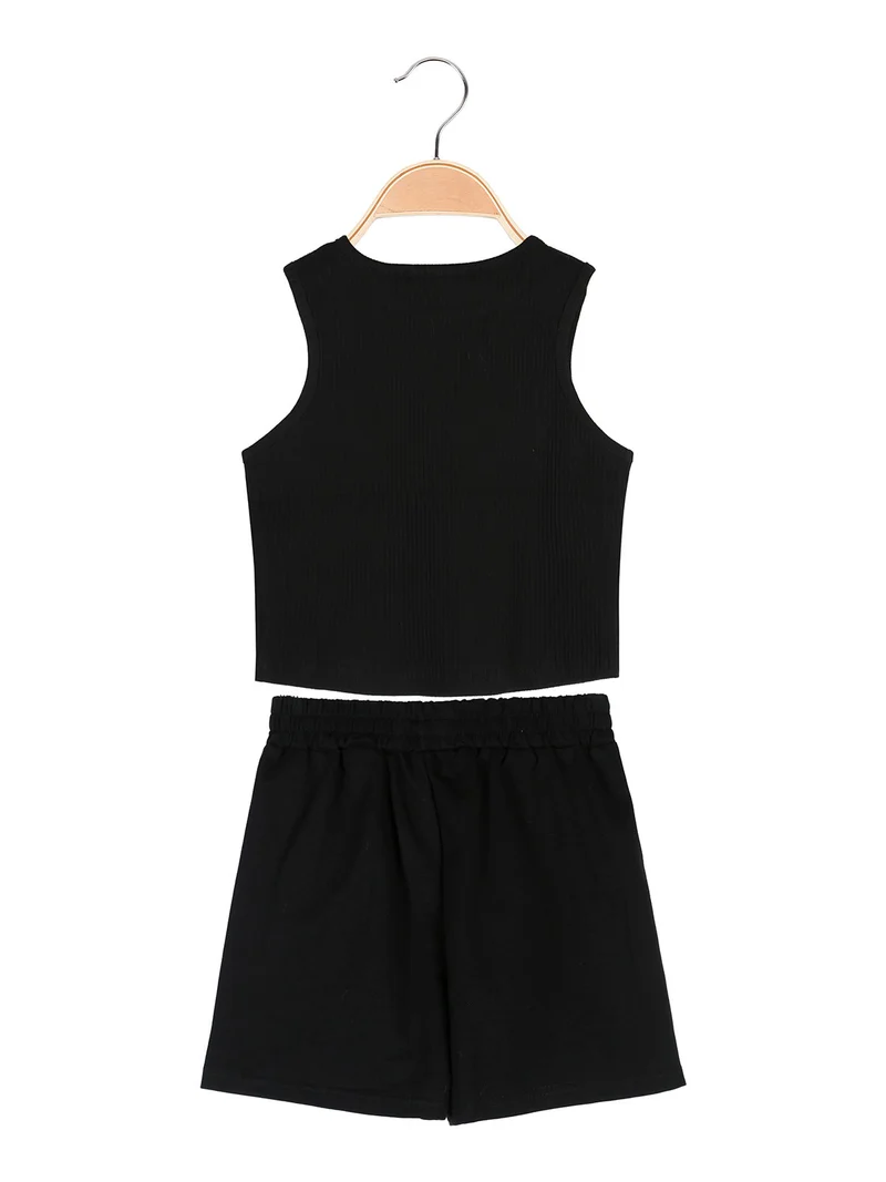 Completo corto da ragazza con top a costine e shorts - nero