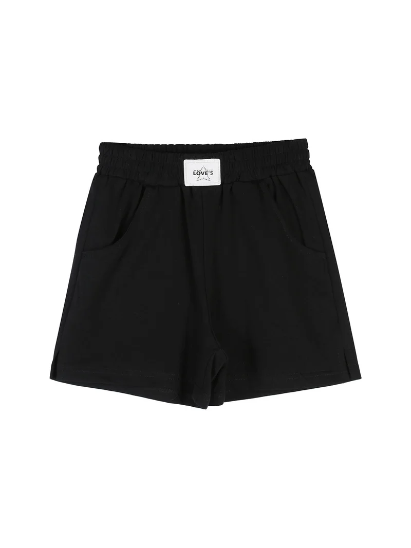 Completo corto da ragazza con top a costine e shorts - nero