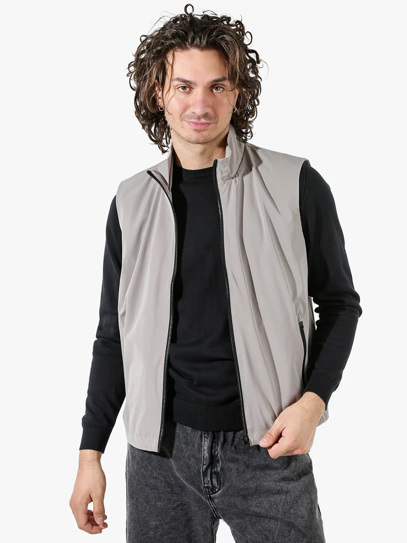Smanicato da uomo leggero e antivento - fango