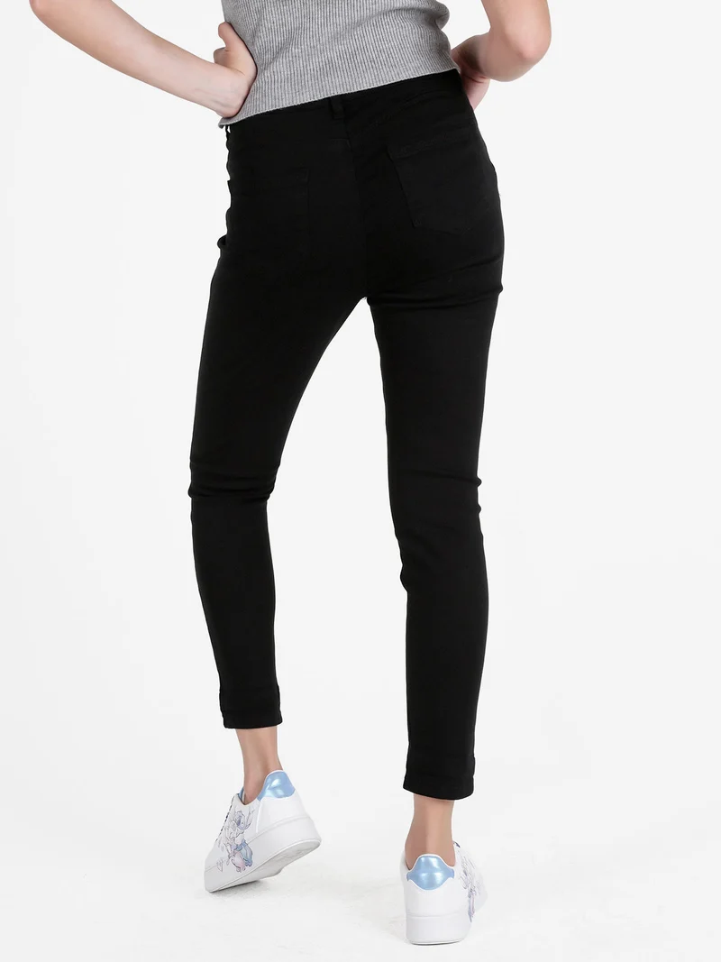 Pantaloni donna skinny push up - nero