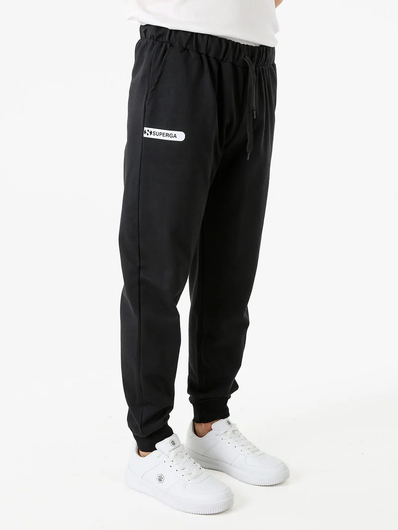 Pantaloni tuta da uomo in felpa con coulisse e polsini - nero