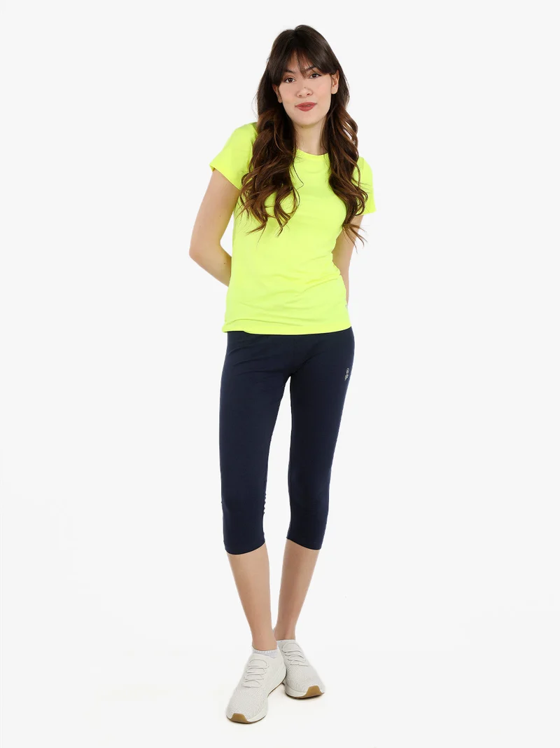 T-shirt sportiva da donna in tessuto tecnico - giallo