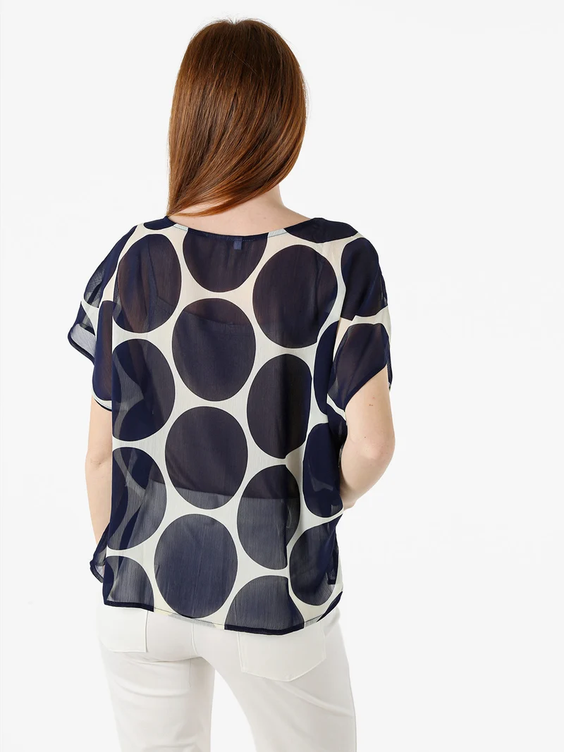 Blusa donna velata senza maniche con stampa a cerchi - blu