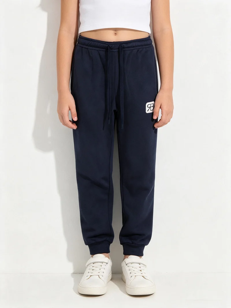Pantaloni tuta felpati da bambina - rosa