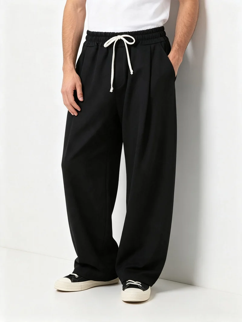 Pantaloni da uomo oversize a gamba larga con coulisse - nero