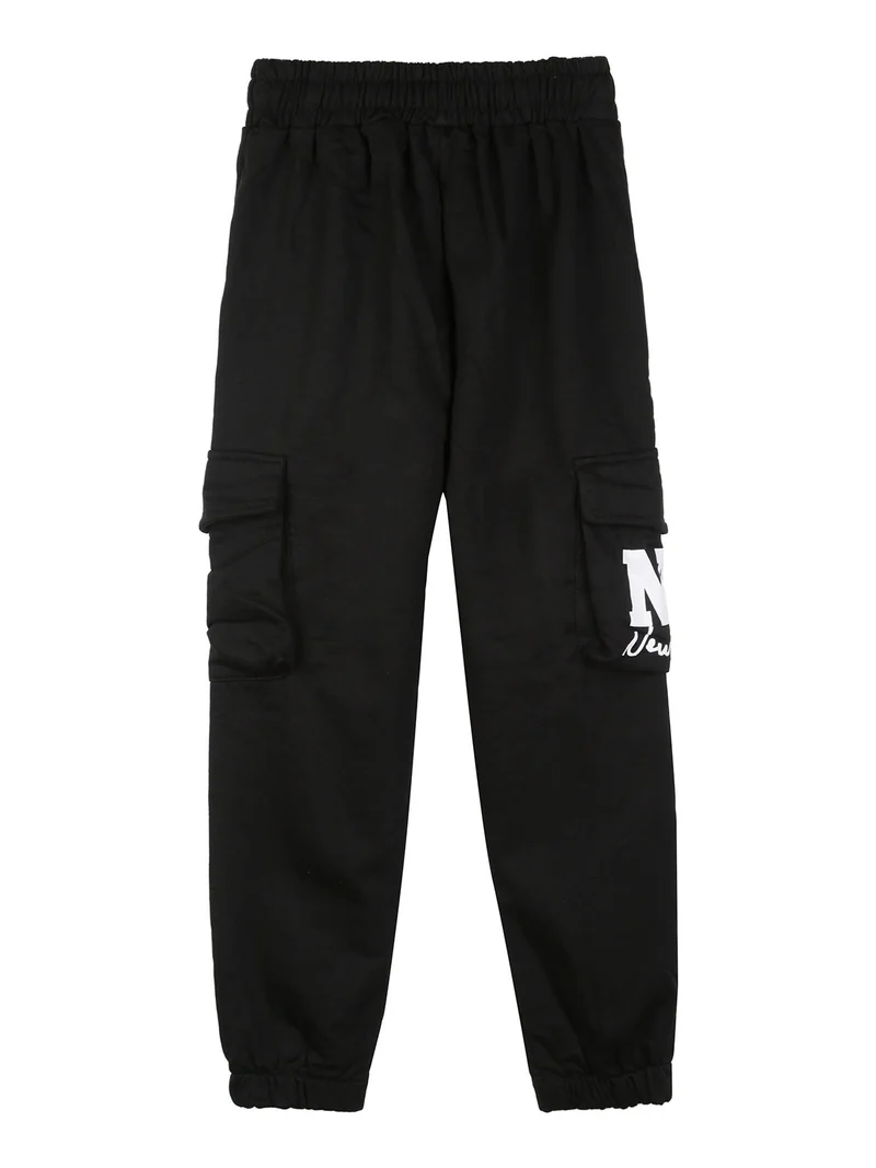 Pantaloni sportivi da bambino con tasconi laterali e interno felpato - nero