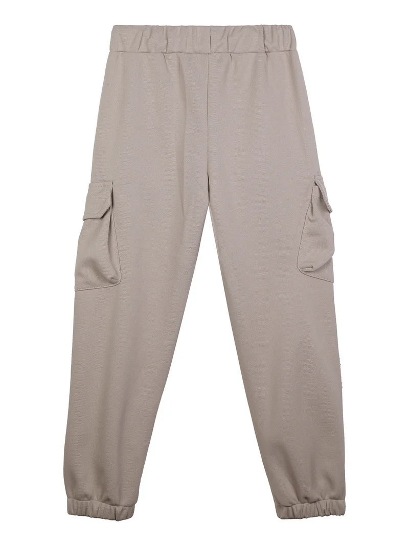 Pantaloni da bambino con tasconi e polsini - beige