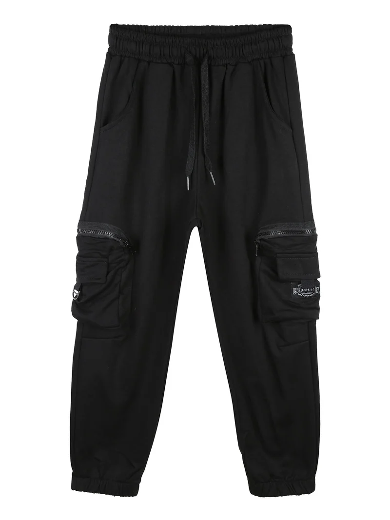 Pantaloni tuta da bambino con tasconi laterali e polsini - nero