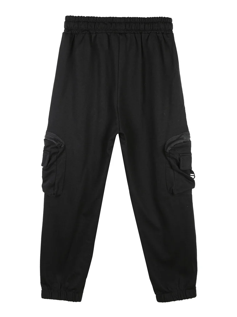 Pantaloni tuta da bambino con tasconi laterali e polsini - nero