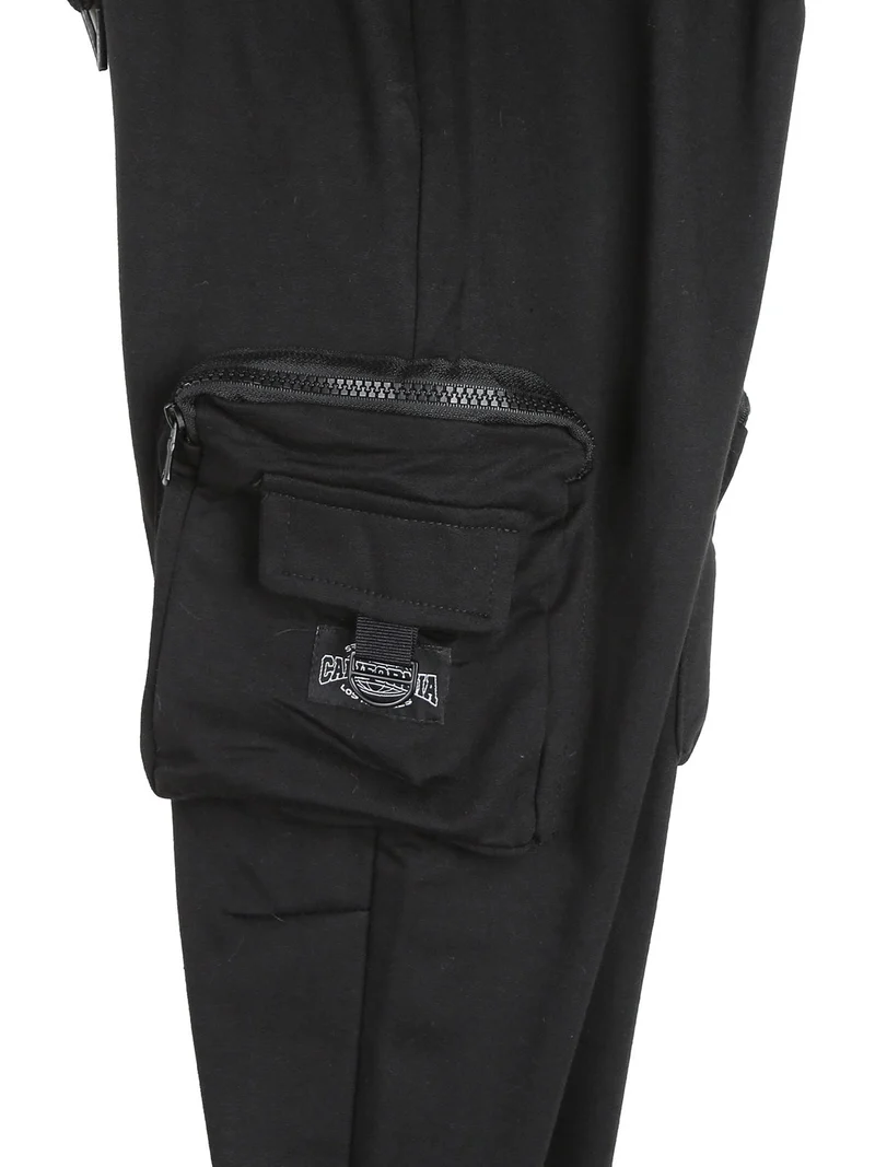 Pantaloni tuta da bambino con tasconi laterali e polsini - nero