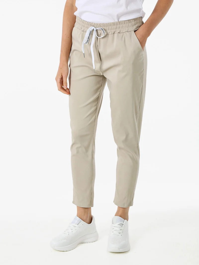 Pantaloni donna elasticizzati con coulisse - beige