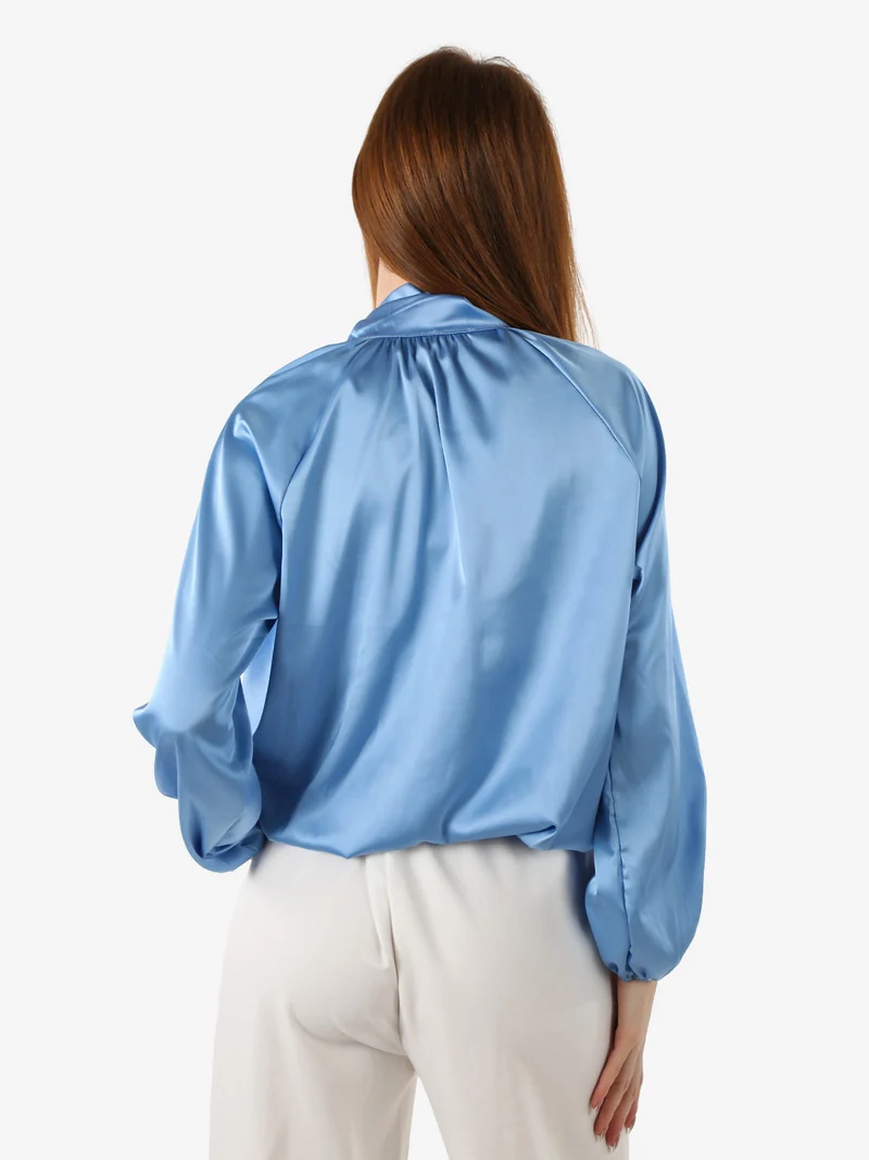 Blusa donna in tessuto simil raso a maniche lunghe - azzurro