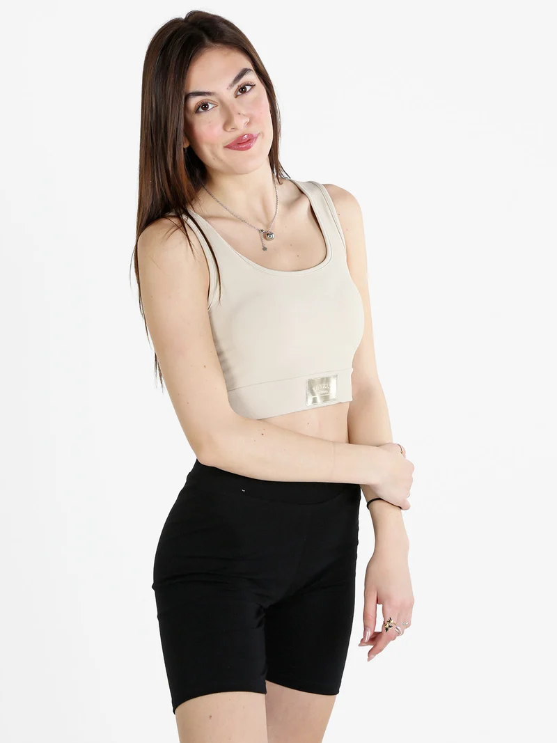 Top donna sportivo a costine con coppe imbottite - beige