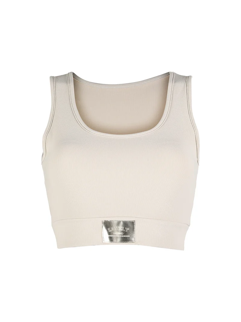 Top donna sportivo a costine con coppe imbottite - beige