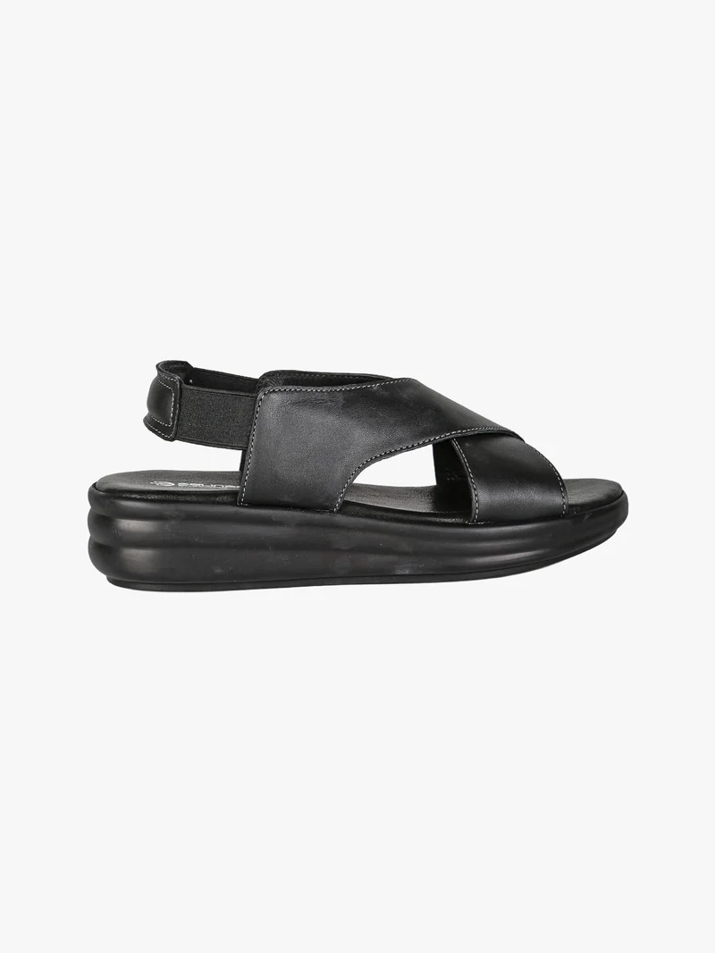 Sandali in pelle da donna con cinturino elastico e zeppa - nero
