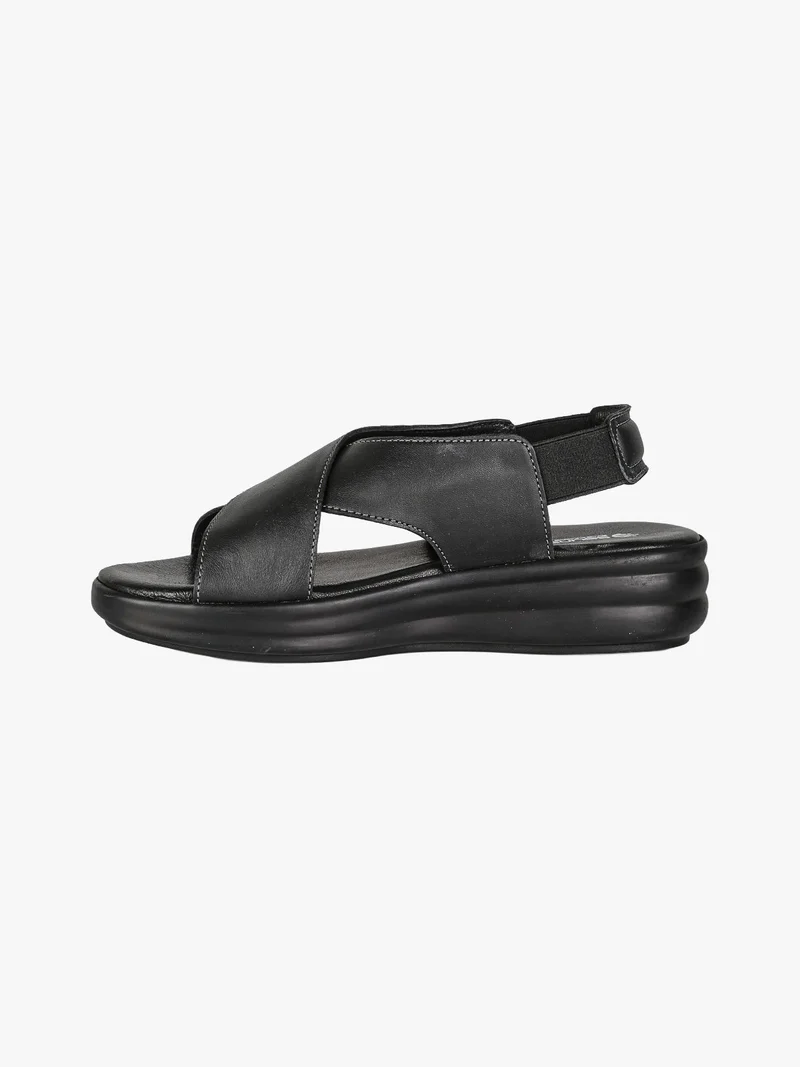 Sandali in pelle da donna con cinturino elastico e zeppa - nero