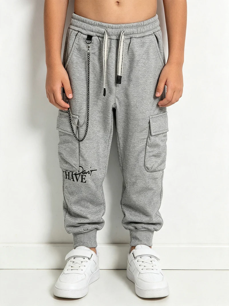 Pantaloni cargo da bambino con coulisse e catena decorativa - grigio