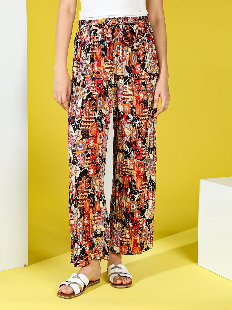 Pantaloni donna plissettati a gamba larga con stampe - nero
