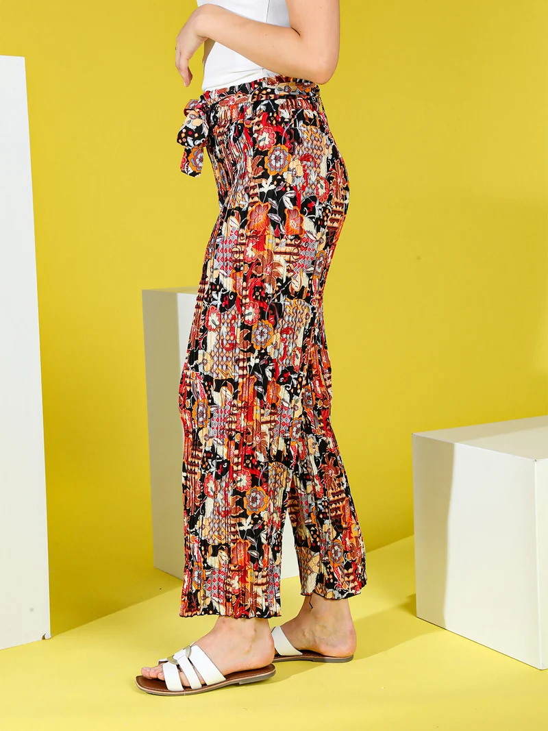 Pantaloni donna plissettati a gamba larga con stampe - nero