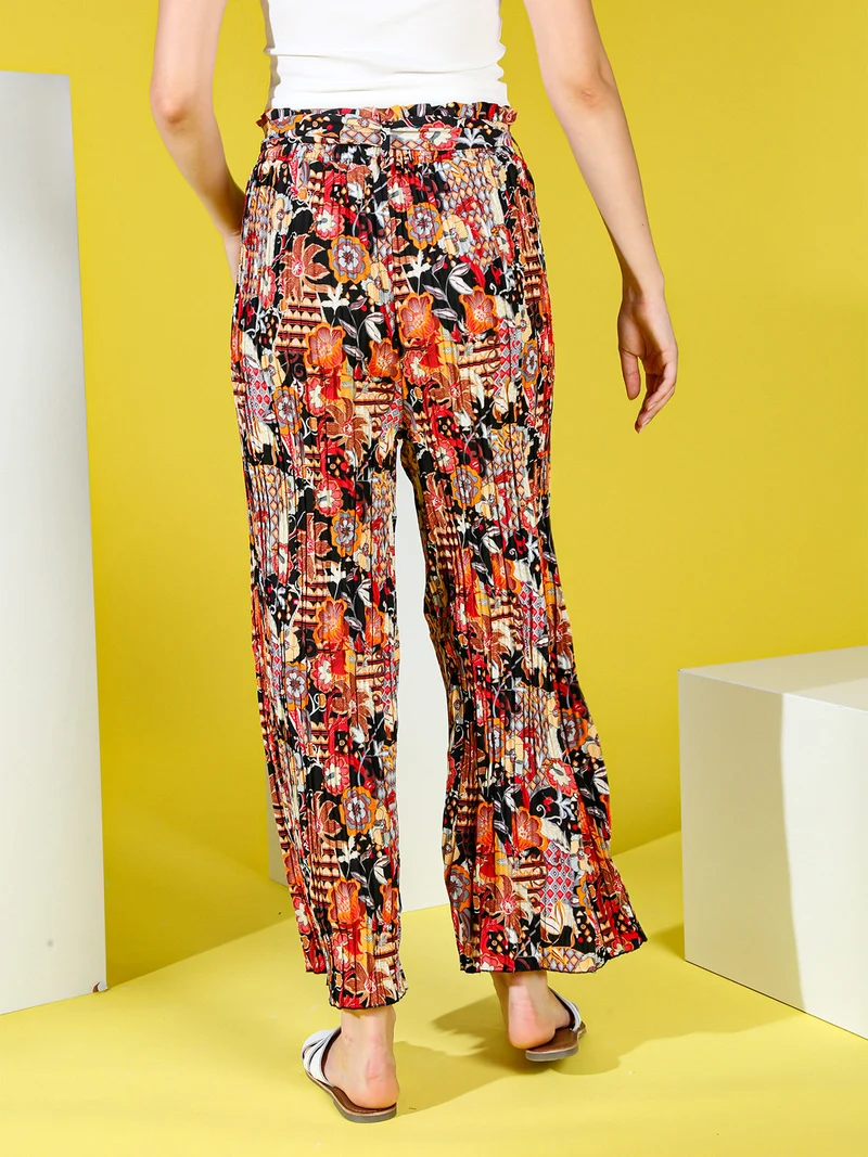 Pantaloni donna plissettati a gamba larga con stampe - nero