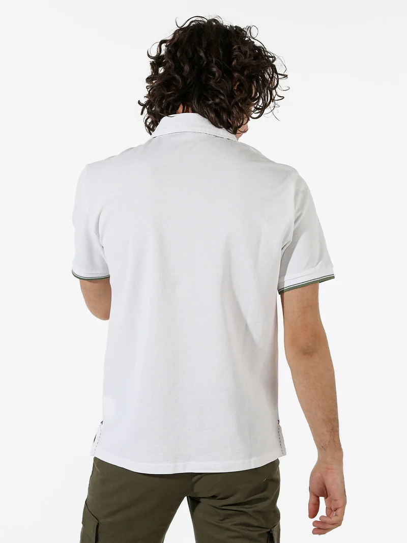 Polo da uomo in cotone a maniche corte con taschino a filetto - bianco