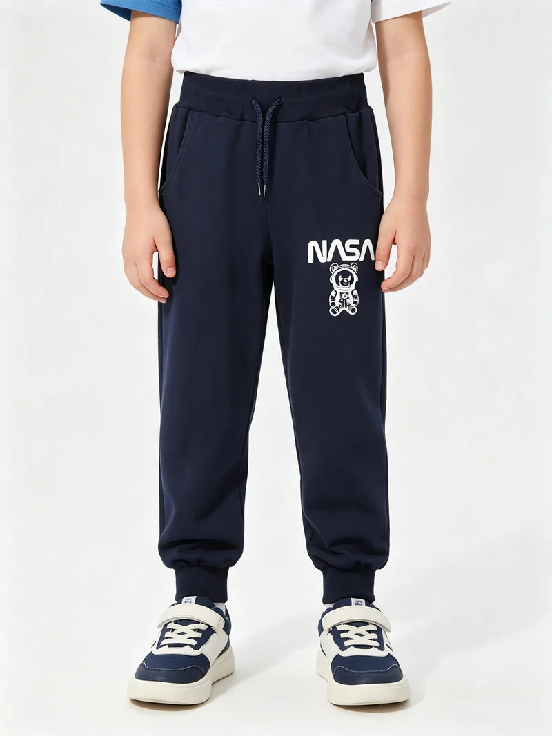 Pantaloni in felpa da ragazzo con coulisse - blu scuro