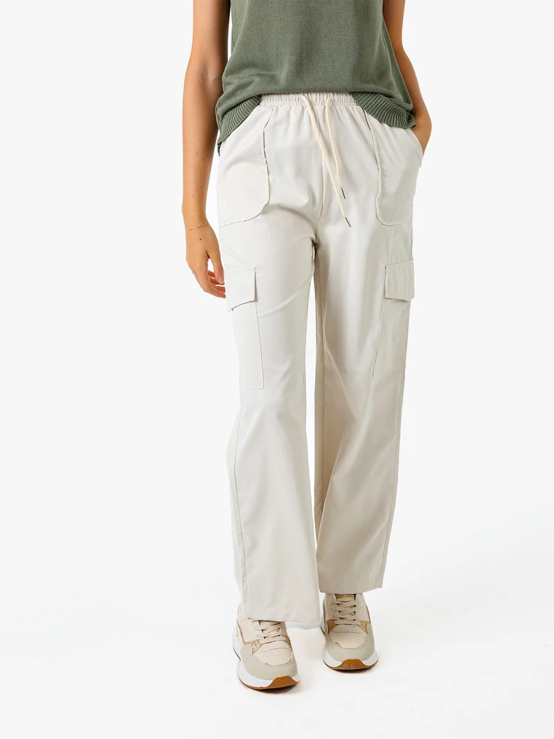 Pantaloni donna a gamba larga con tasconi laterali e coulisse - beige