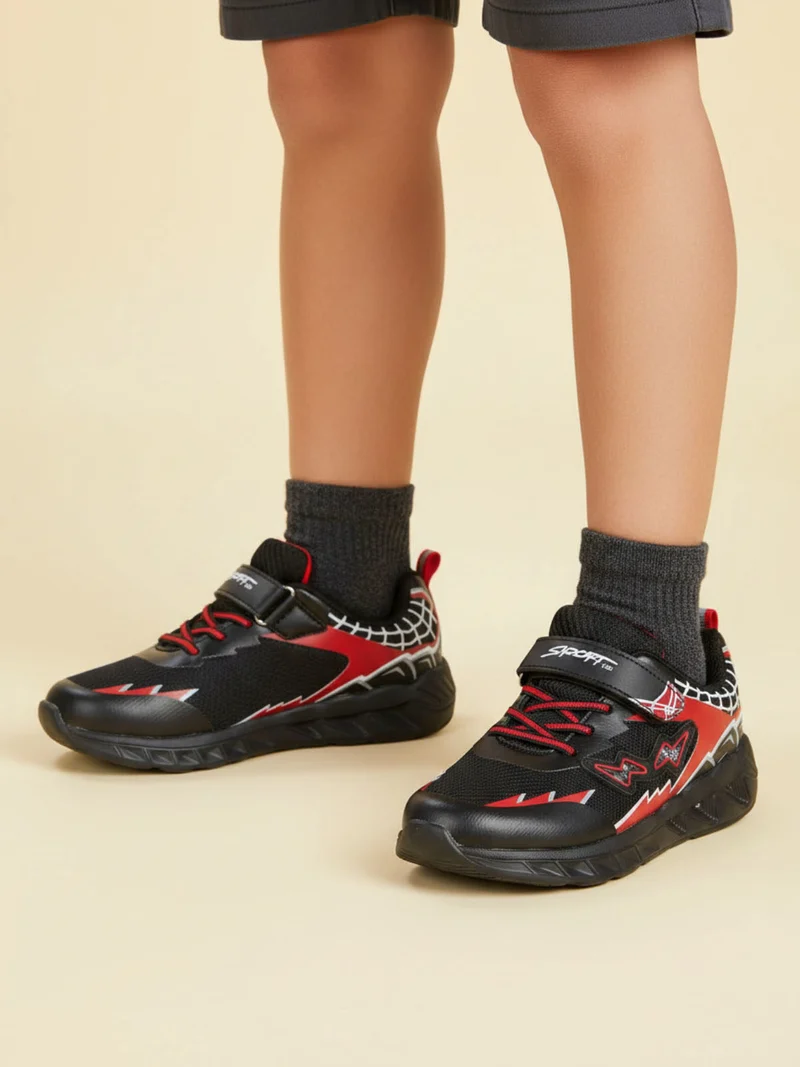 Sneakers da ragazzo con luci e cinturino a strappo - nero