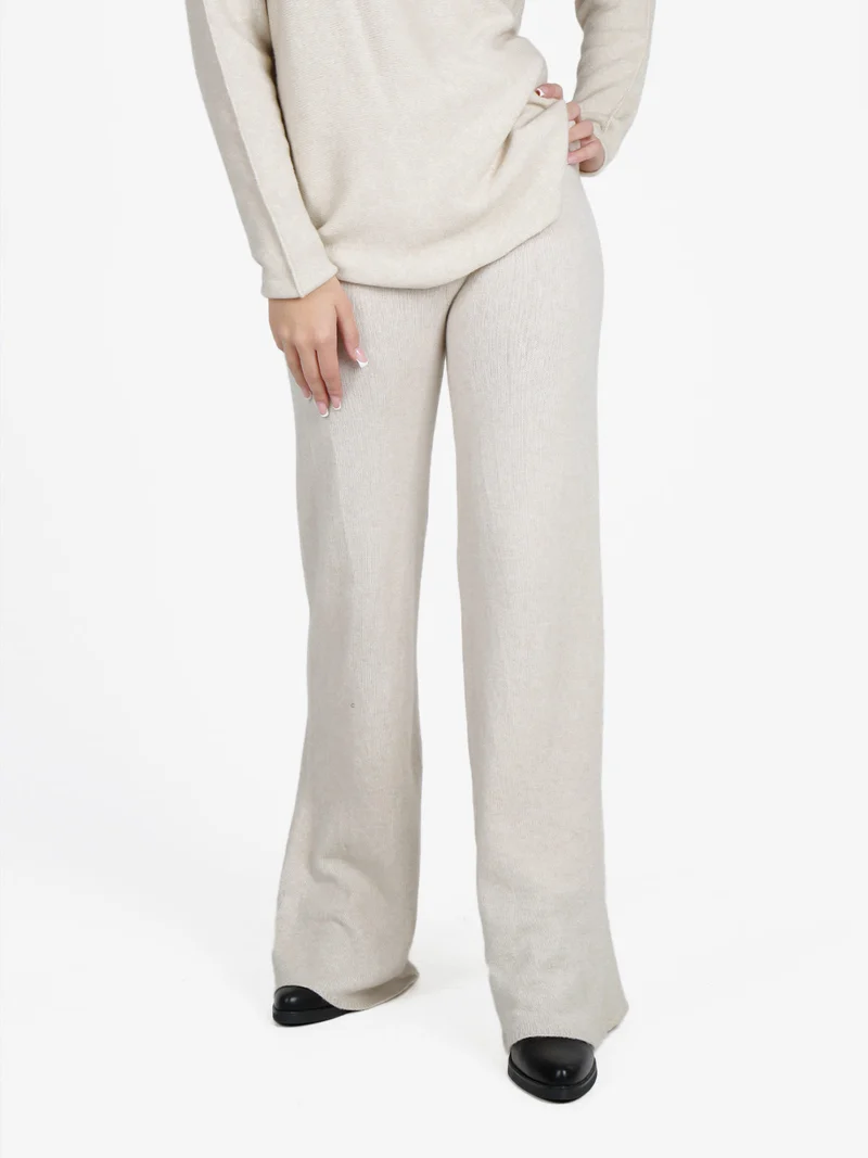 Pantaloni donna in maglia a vita alta con finale a zampa - beige