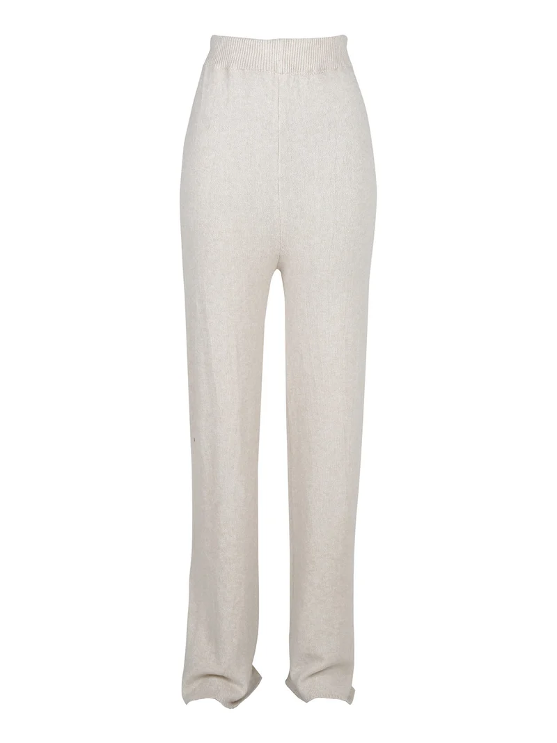 Pantaloni donna in maglia a vita alta con finale a zampa - beige