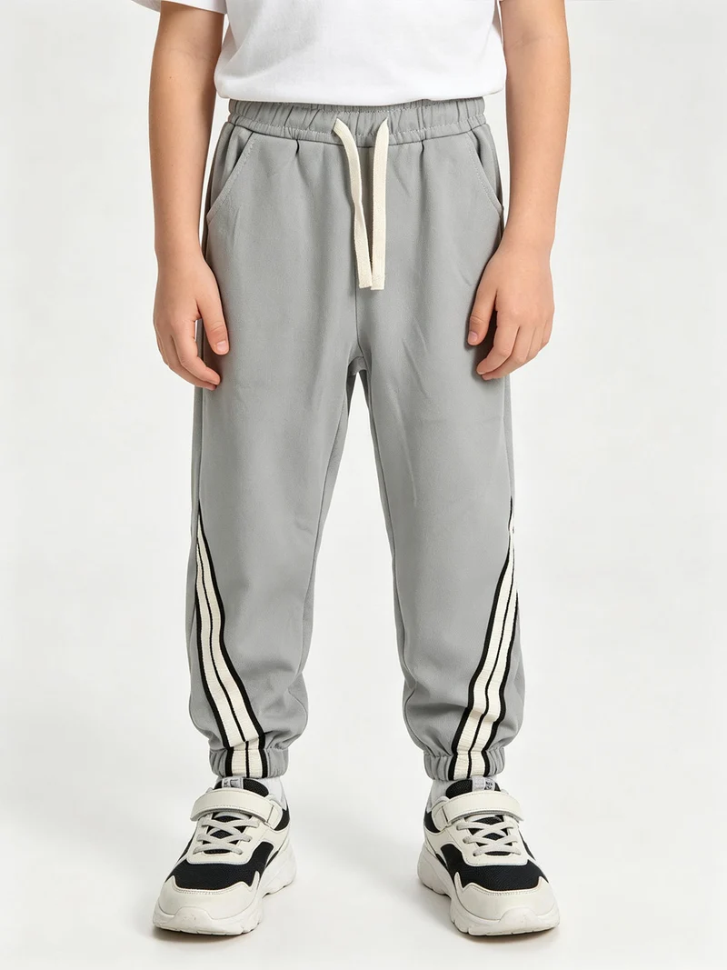 Pantaloni tuta da bambino - grigio chiaro
